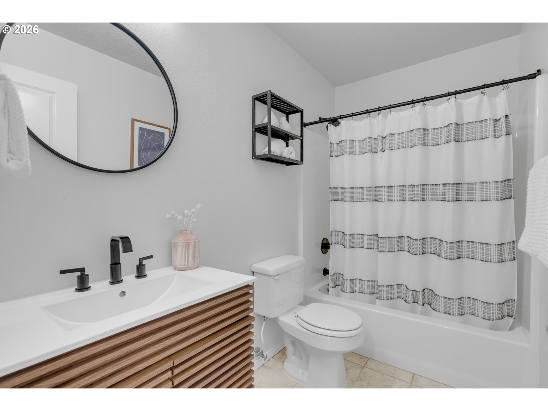 435 Northeast Cook Street Portland, OR 97212 - Photo 20 of 32 a bathroom with a sink a toilet and a mirror