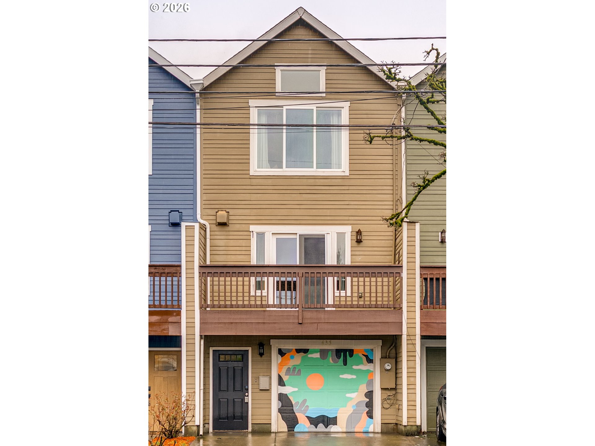435 Northeast Cook Street Portland, OR 97212 - Photo 2 of 32 a front view of a house with a yard