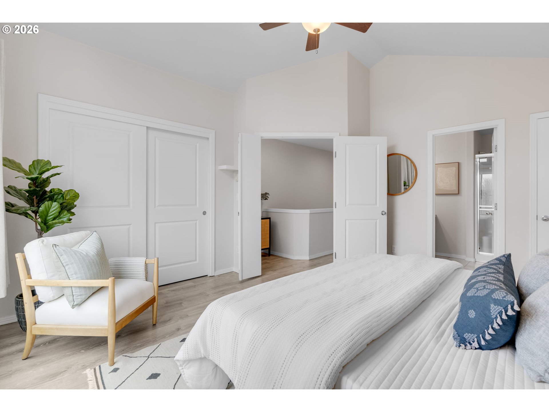 435 Northeast Cook Street Portland, OR 97212 - Photo 23 of 32 a bedroom with a bed and a chair