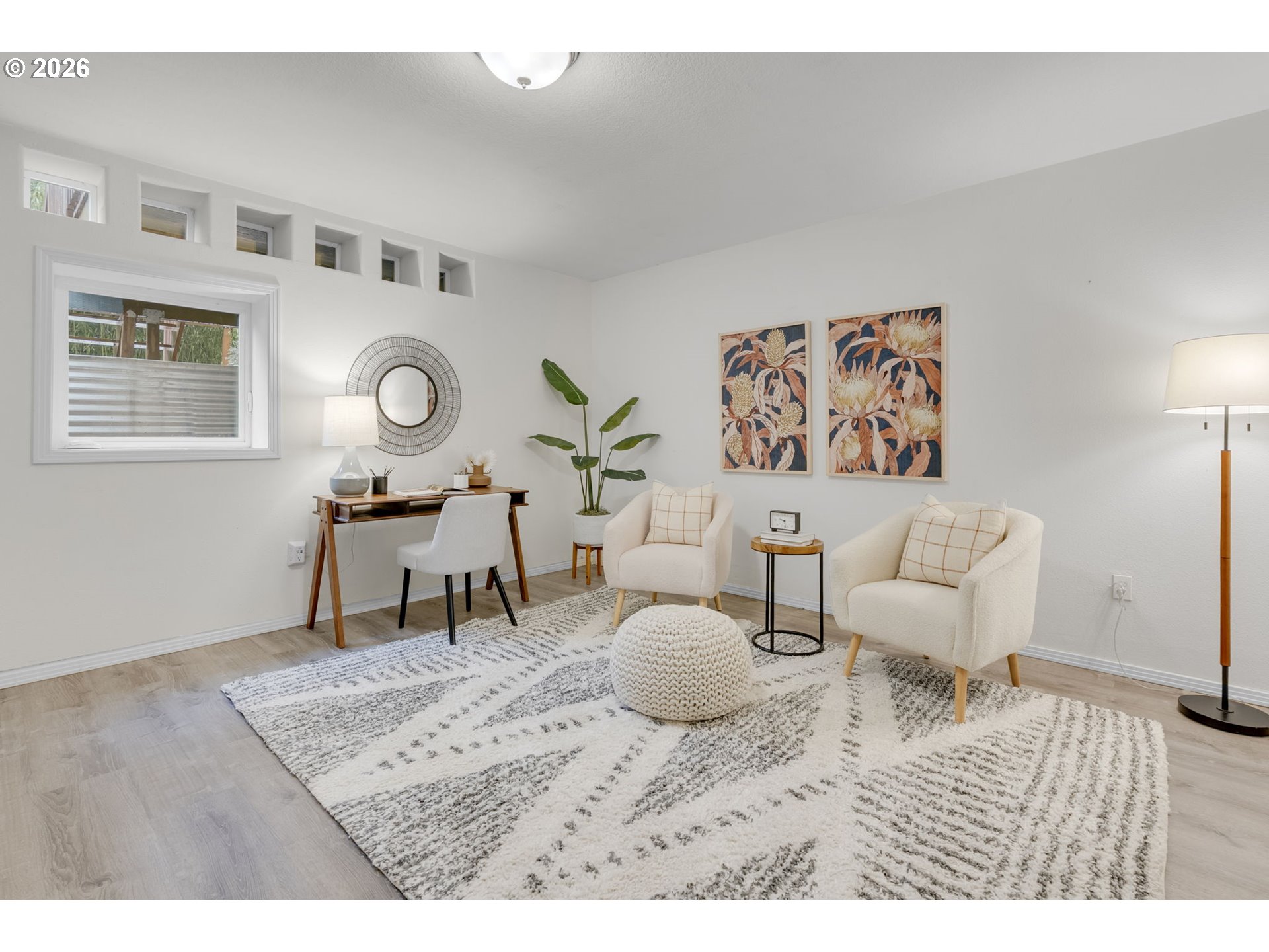 435 Northeast Cook Street Portland, OR 97212 - Photo 26 of 32 a living room with furniture and wooden floor