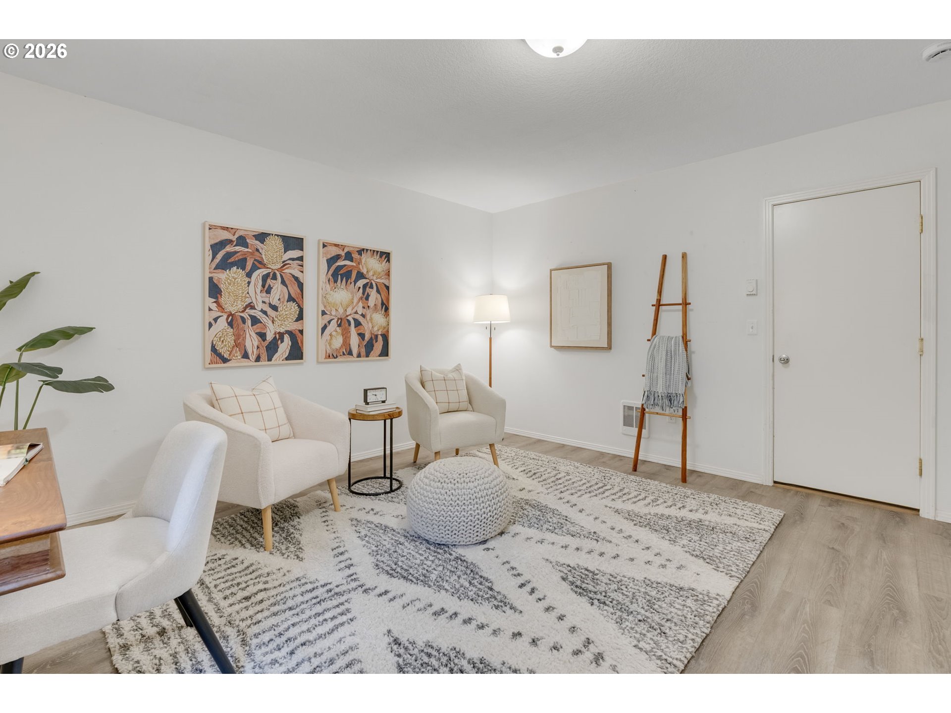 435 Northeast Cook Street Portland, OR 97212 - Photo 27 of 32 a living room with furniture and a wooden floor