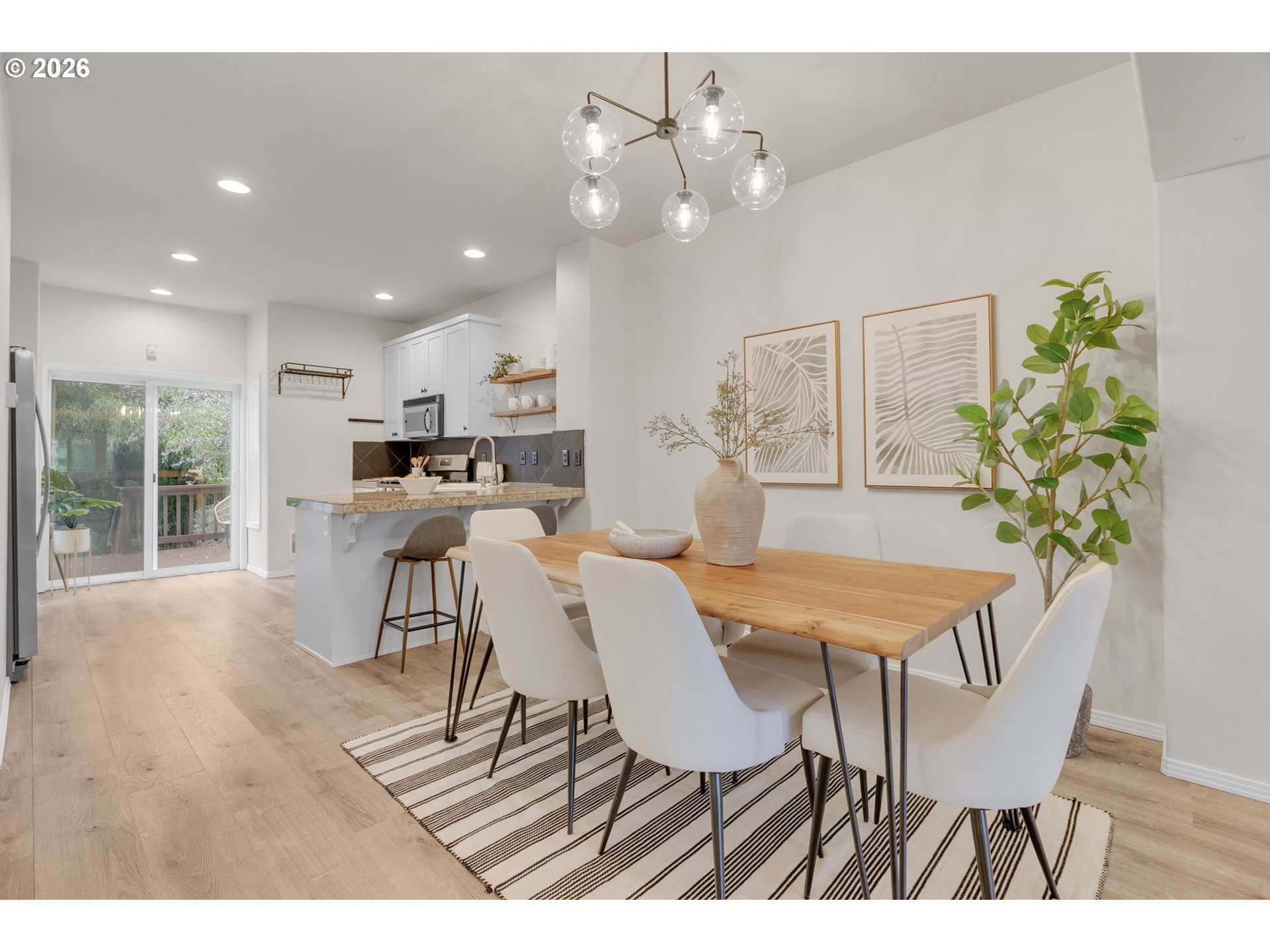435 Northeast Cook Street Portland, OR 97212 - Photo 9 of 32 a view of a dining room with furniture and a large window