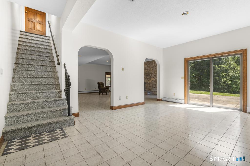 49 Partridge Lane Middletown, CT 06457 - Photo 23 of 39 a view of an entryway with wooden floor