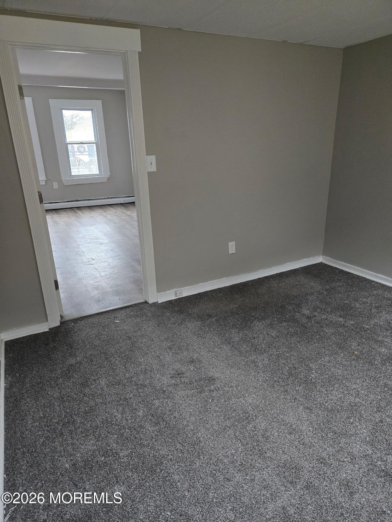 43 Webb Avenue, Unit C Ocean Grove, NJ 07756 - Photo 11 of 18 an empty room with windows