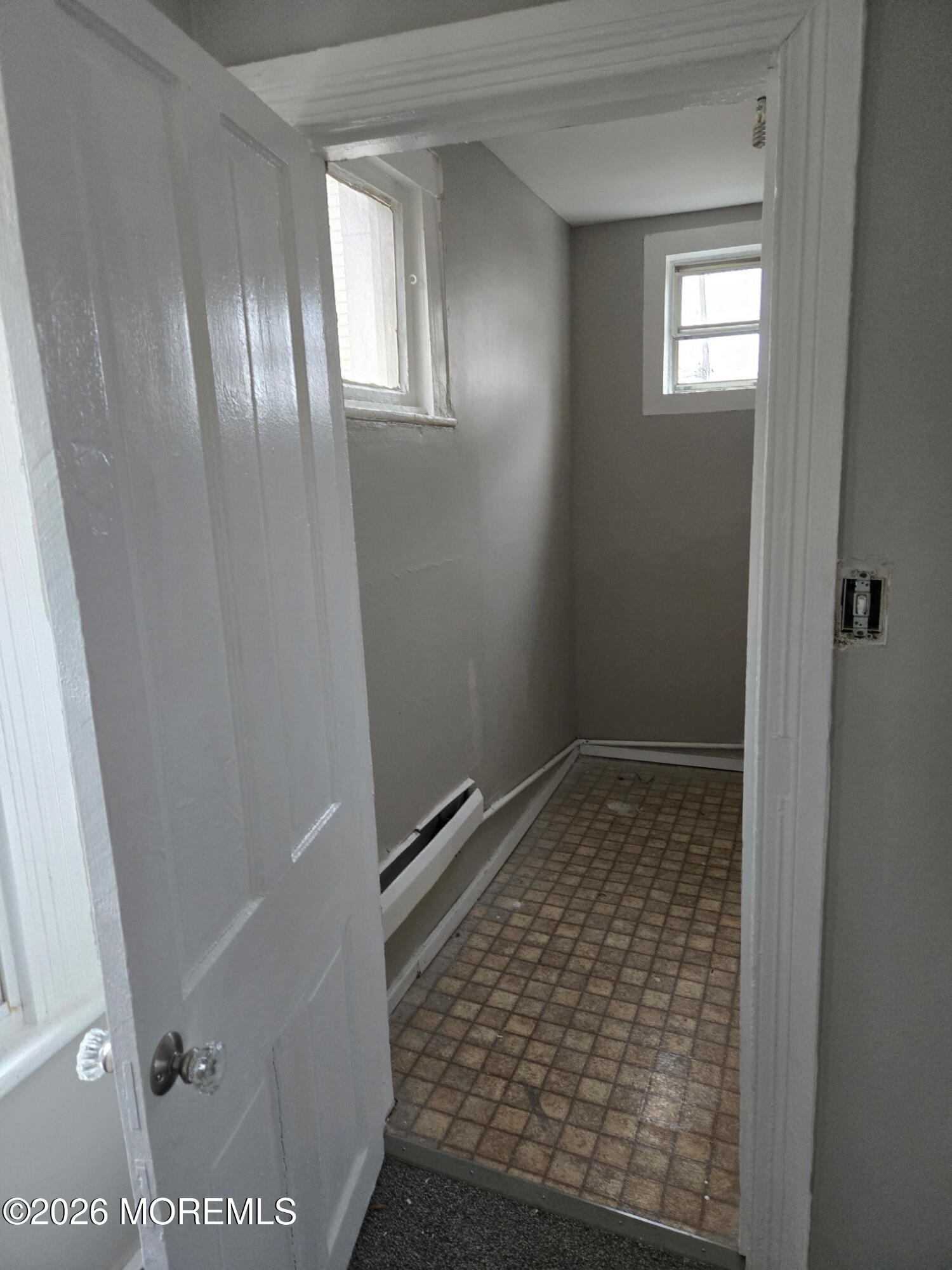 43 Webb Avenue, Unit C Ocean Grove, NJ 07756 - Photo 12 of 18 a bathroom with a glass door shower