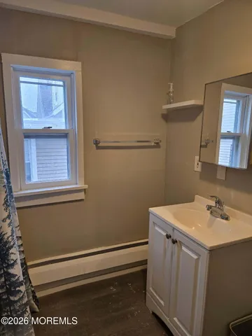a bathroom with a sink and a vanity