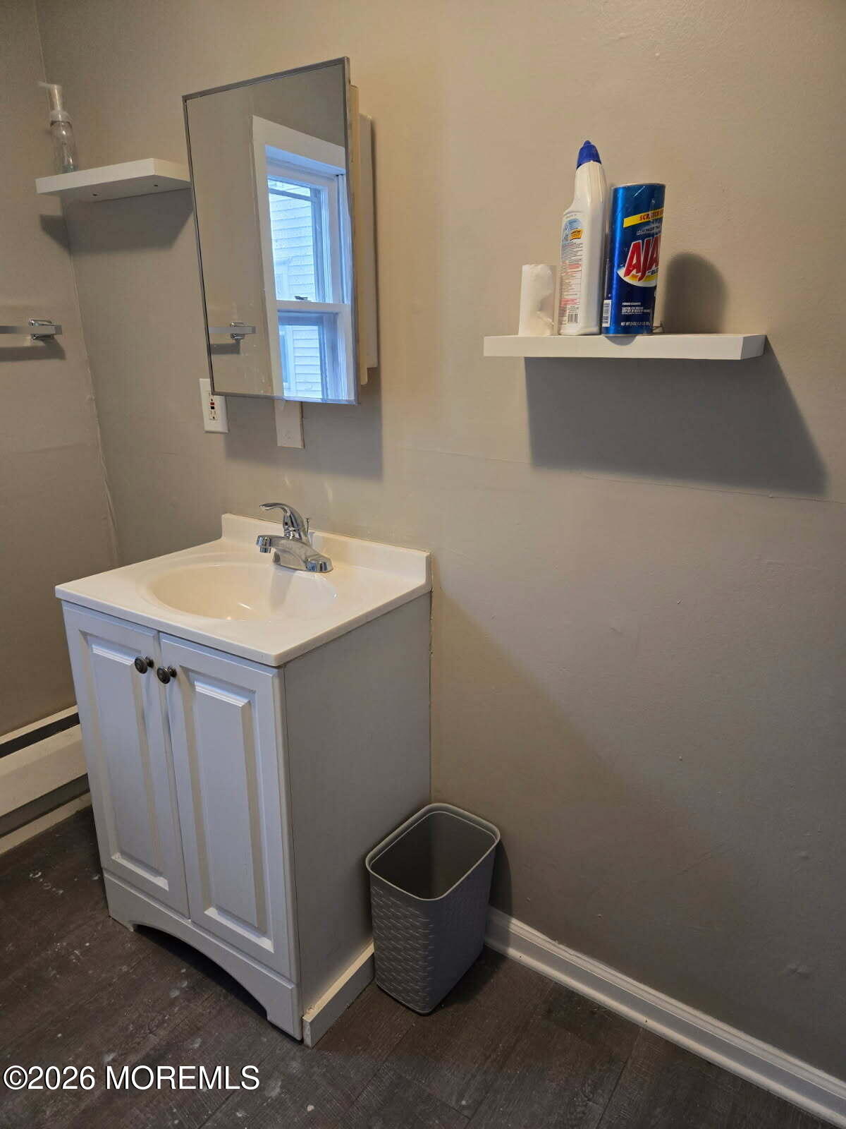 43 Webb Avenue, Unit C Ocean Grove, NJ 07756 - Photo 17 of 18 a bathroom with a sink and a vanity