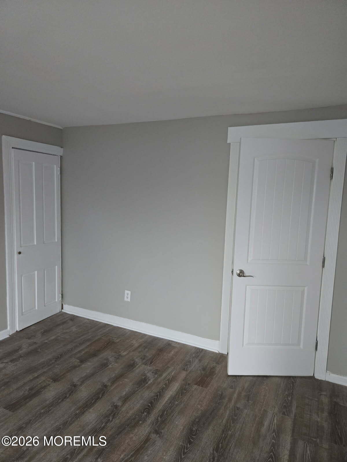 43 Webb Avenue, Unit C Ocean Grove, NJ 07756 - Photo 4 of 18 a view of an empty room with wooden floor