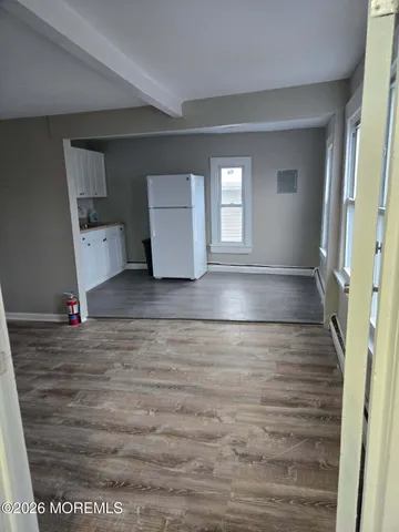 a view of an empty room and window