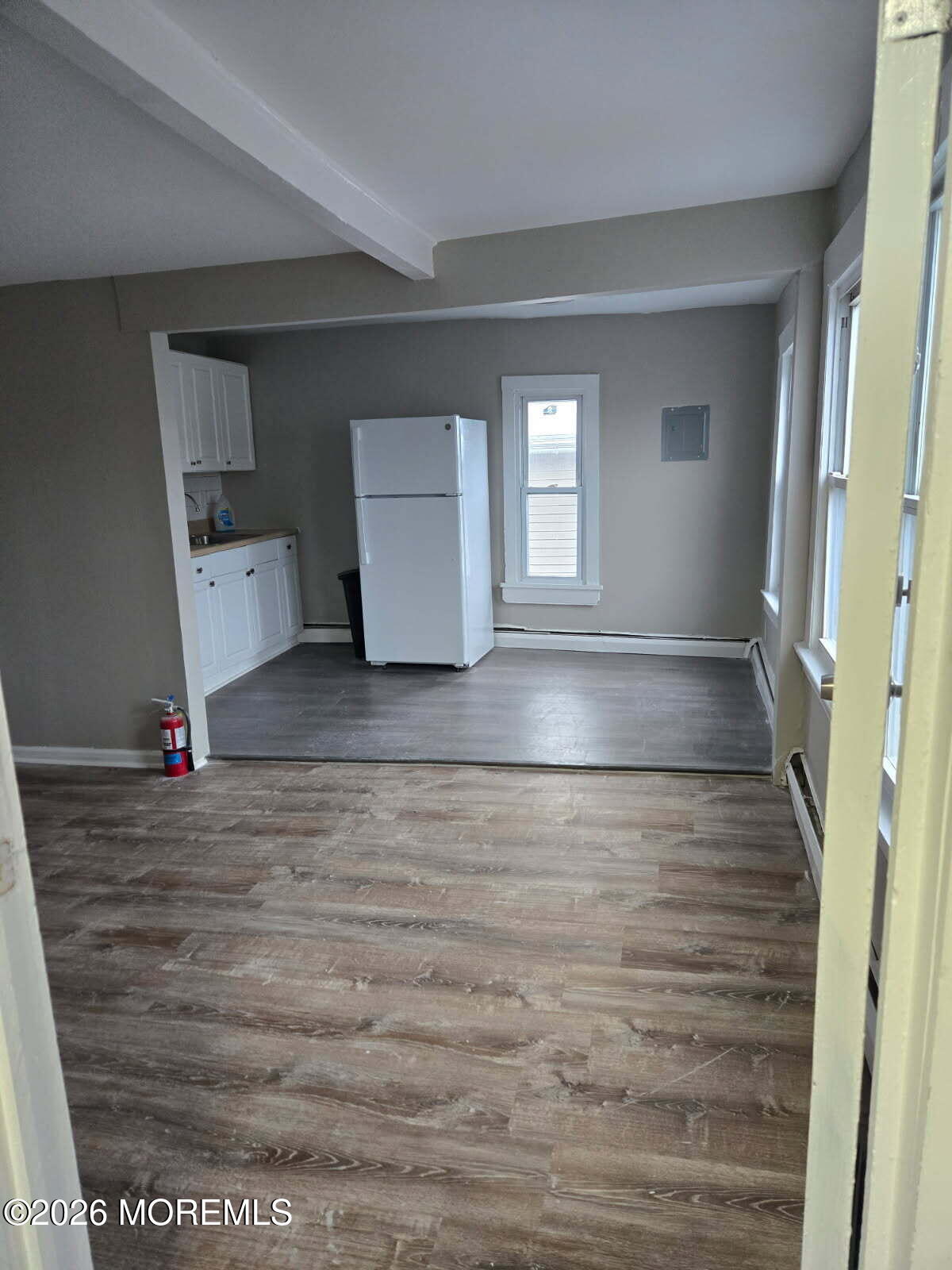43 Webb Avenue, Unit C Ocean Grove, NJ 07756 - Photo 5 of 18 a view of an empty room and window
