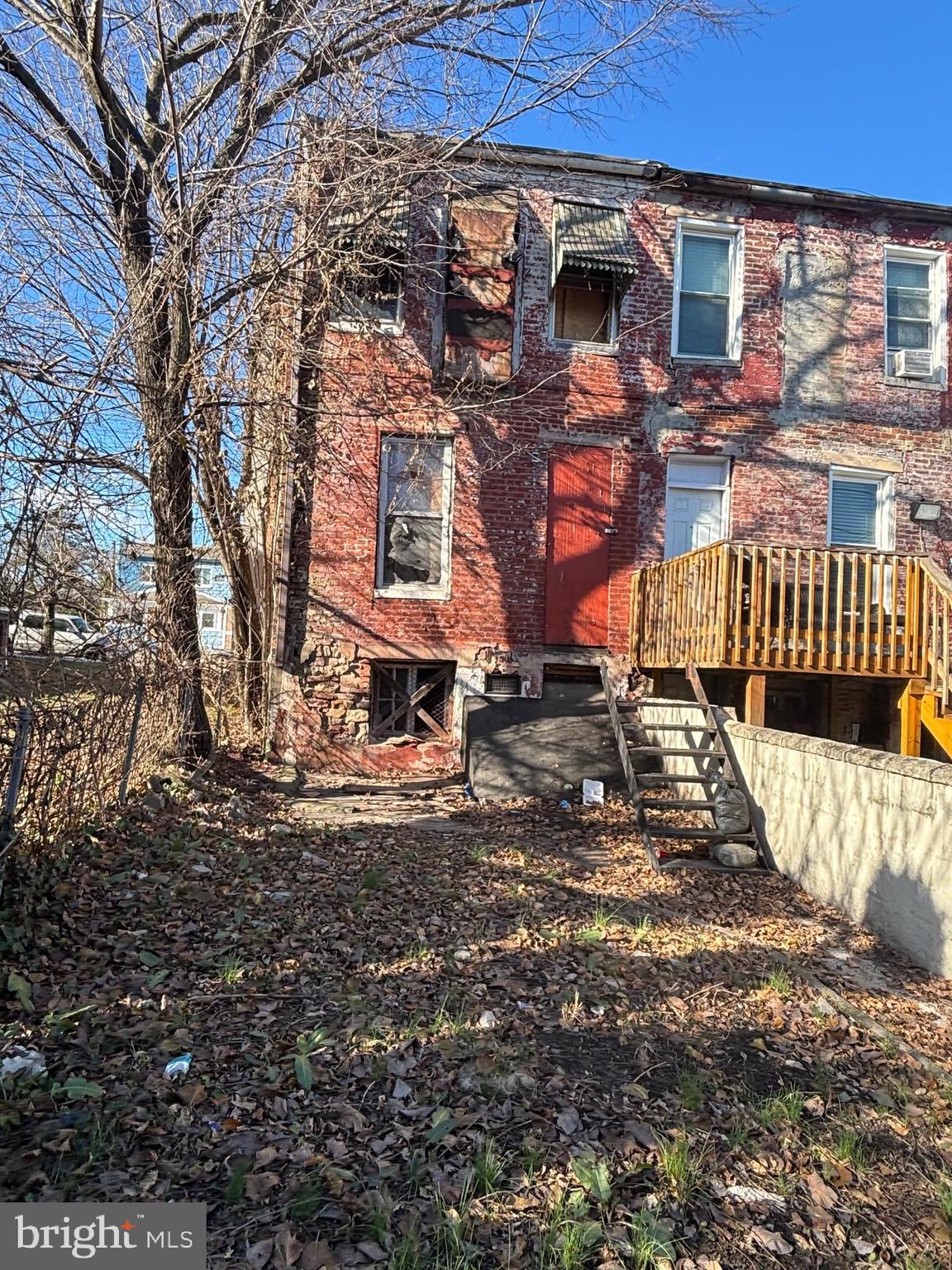 2317 Annapolis Road Baltimore, MD 21230 - Photo 12 of 14 a front view of a house with a yard