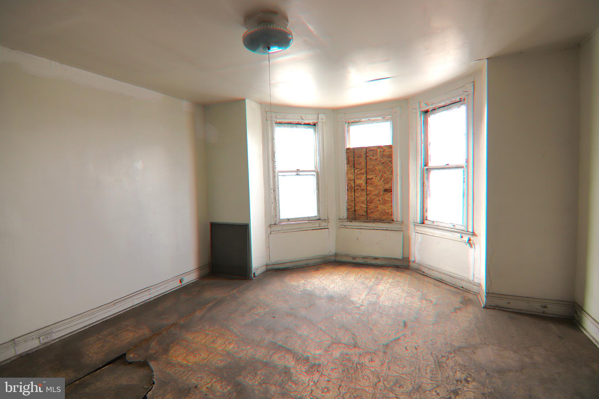 2317 Annapolis Road Baltimore, MD 21230 - Photo 6 of 14 a view of an empty room with a window