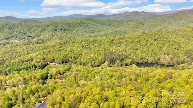 a view of mountain with an ocean view