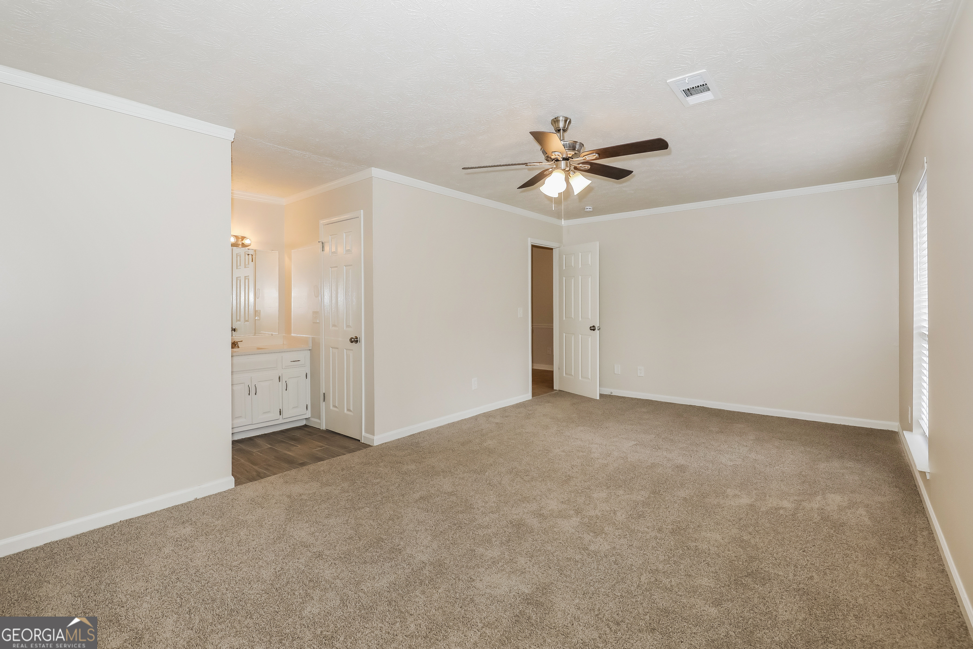 125 Whitney Way Fayetteville, GA 30214 - Photo 8 of 16 wooden floor in an empty room