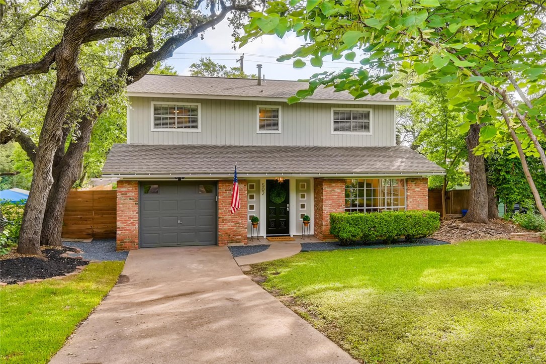 502 Lightsey Road Austin, TX 78704 - Photo 1 of 1 a front view of a house with garden