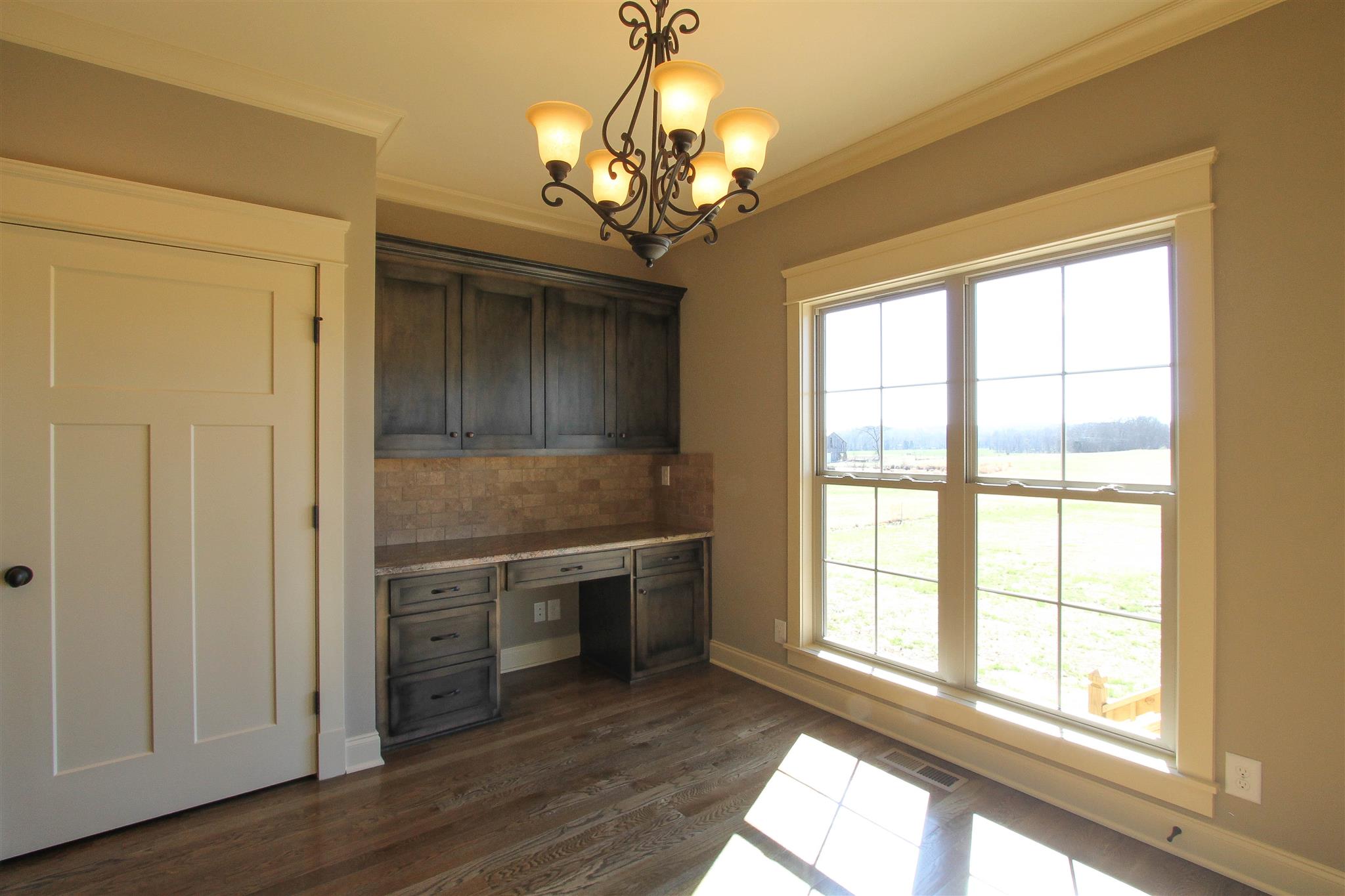 620 Academy Road, Unit 14 Lebanon, TN 37087 - Photo 13 of 24 a view of a room with a window and wooden floor