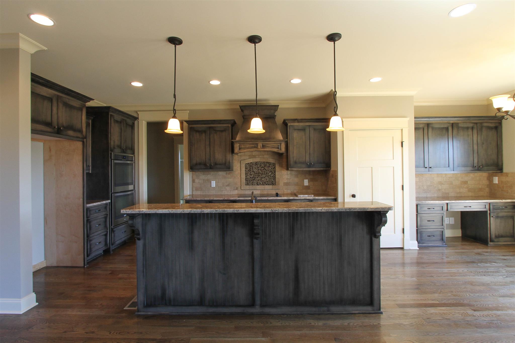 620 Academy Road, Unit 14 Lebanon, TN 37087 - Photo 8 of 24 a large kitchen with a table and refrigerator