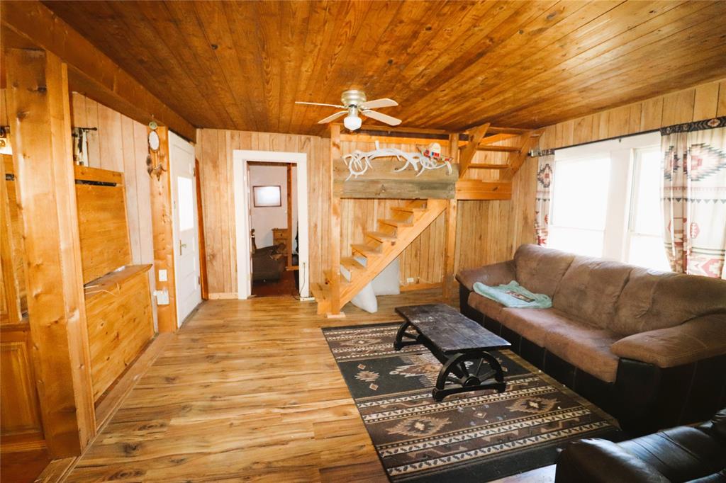 10543 Old Joy Shannon Road Henrietta, TX 76365 - Photo 12 of 36 a living room with furniture and a window