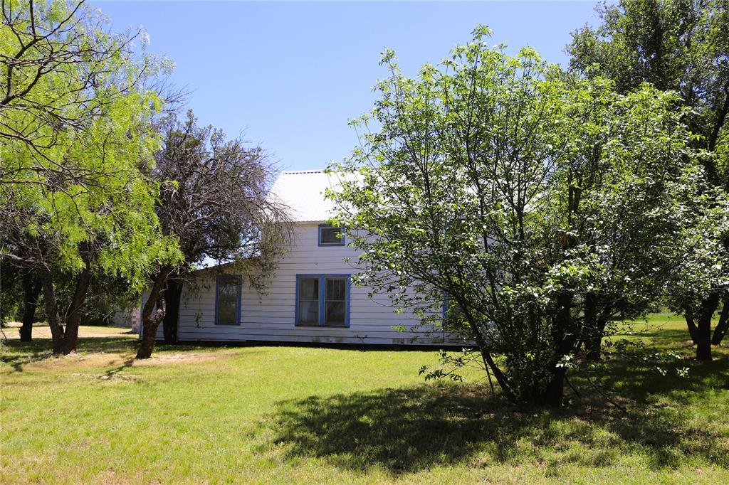 10543 Old Joy Shannon Road Henrietta, TX 76365 - Photo 21 of 36 a view of a house with a yard