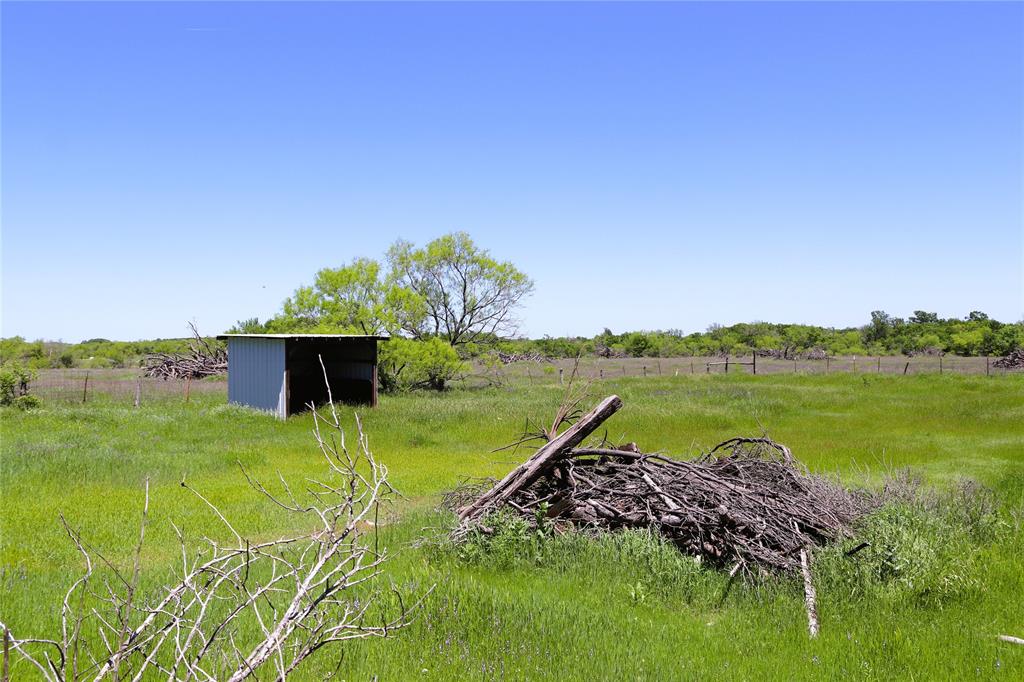 10543 Old Joy Shannon Road Henrietta, TX 76365 - Photo 23 of 36 a view of a lake with a big yard