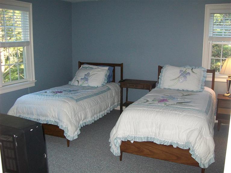 71 Meadowbrook Road Mashpee, MA 02649 - Photo 13 of 14 a bedroom with two beds and a night stand