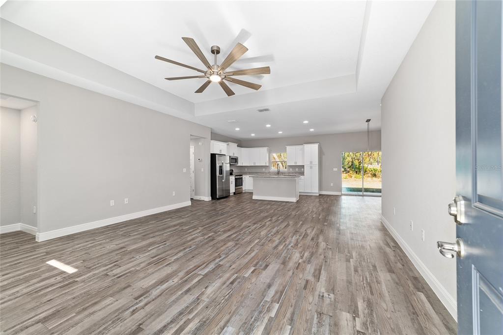 13359 Southwest 80th Street Dunnellon, FL 34432 - Photo 10 of 64 a view of a livingroom with wooden floor