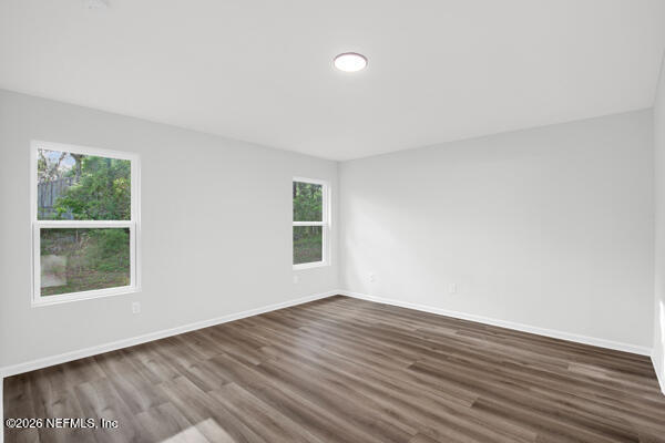 407 Rustic Road Satsuma, FL 32189 - Photo 24 of 55 wooden floor in an empty room with a window