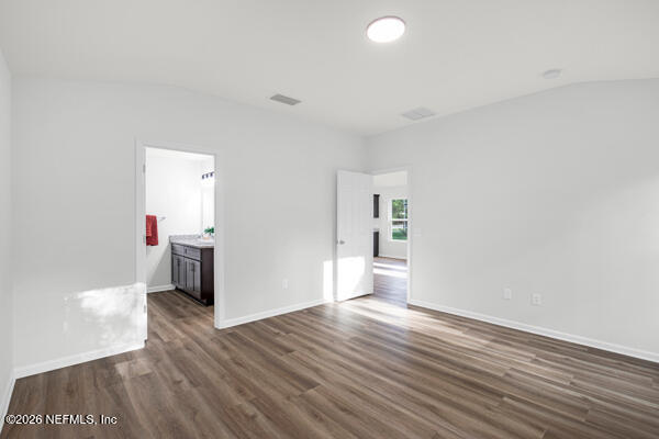 407 Rustic Road Satsuma, FL 32189 - Photo 26 of 55 a view of a room with wooden floor and window