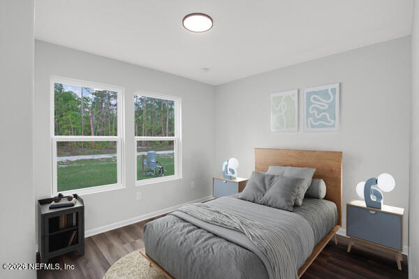 407 Rustic Road Satsuma, FL 32189 - Photo 31 of 55 a bedroom with a bed and a window