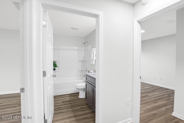407 Rustic Road Satsuma, FL 32189 - Photo 33 of 55 a bathroom with a toilet and a shower