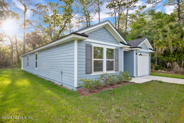 407 Rustic Road Satsuma, FL 32189 - Photo 4 of 55 a view of a house with a yard