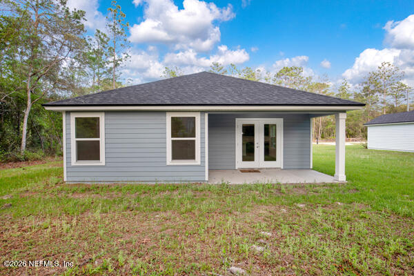 407 Rustic Road Satsuma, FL 32189 - Photo 41 of 55 a front view of house with yard and green space