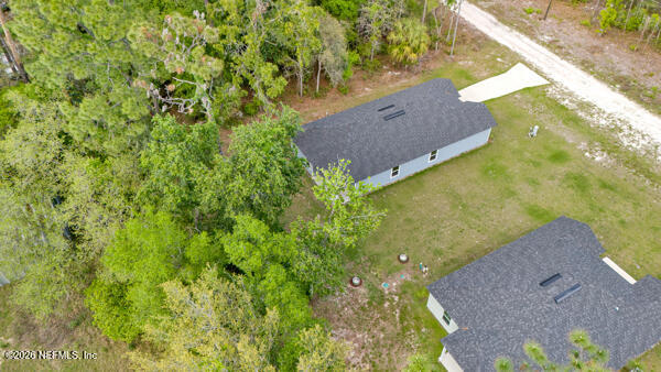 407 Rustic Road Satsuma, FL 32189 - Photo 48 of 55 a view of an outdoor space and a yard
