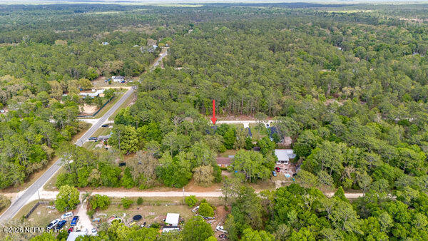 407 Rustic Road Satsuma, FL 32189 - Photo 51 of 55 an aerial view of residential houses with outdoor space and trees