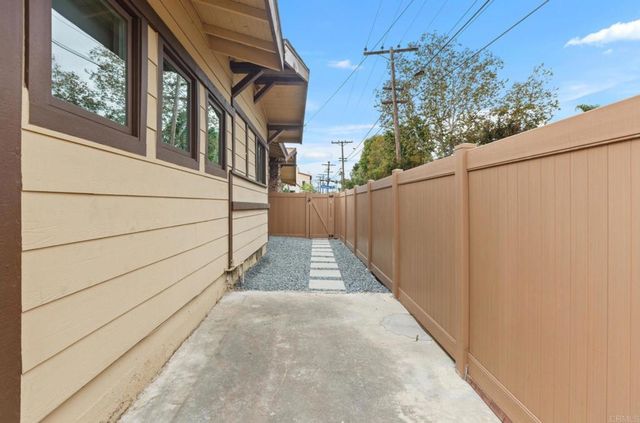 a view of a pathway along a building
