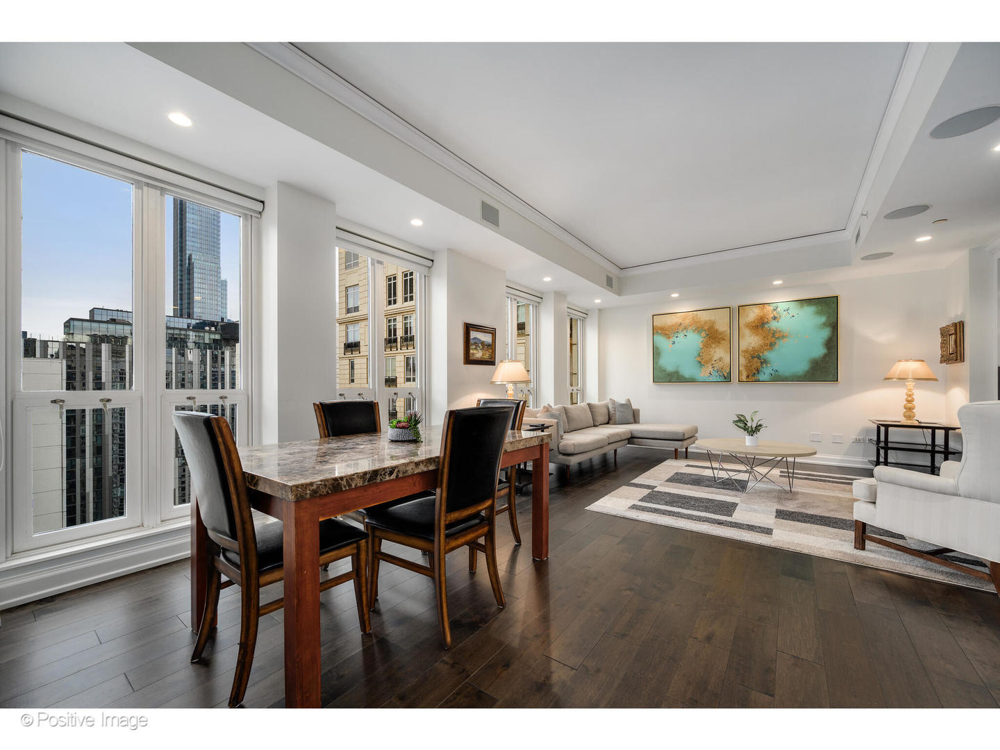 11 East Walton Street, Unit 3201 Chicago, IL 60611 - Photo 14 of 42 a view of a dining room with furniture and wooden floor