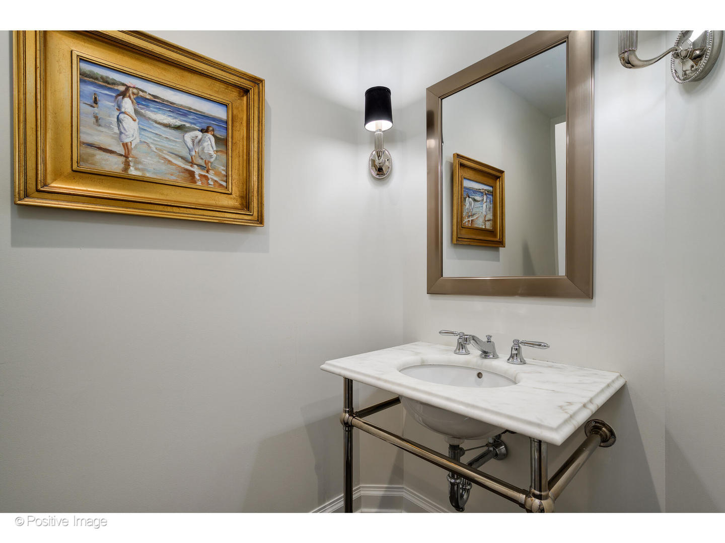 11 East Walton Street, Unit 3201 Chicago, IL 60611 - Photo 20 of 42 a bathroom with a sink and a painting on the wall