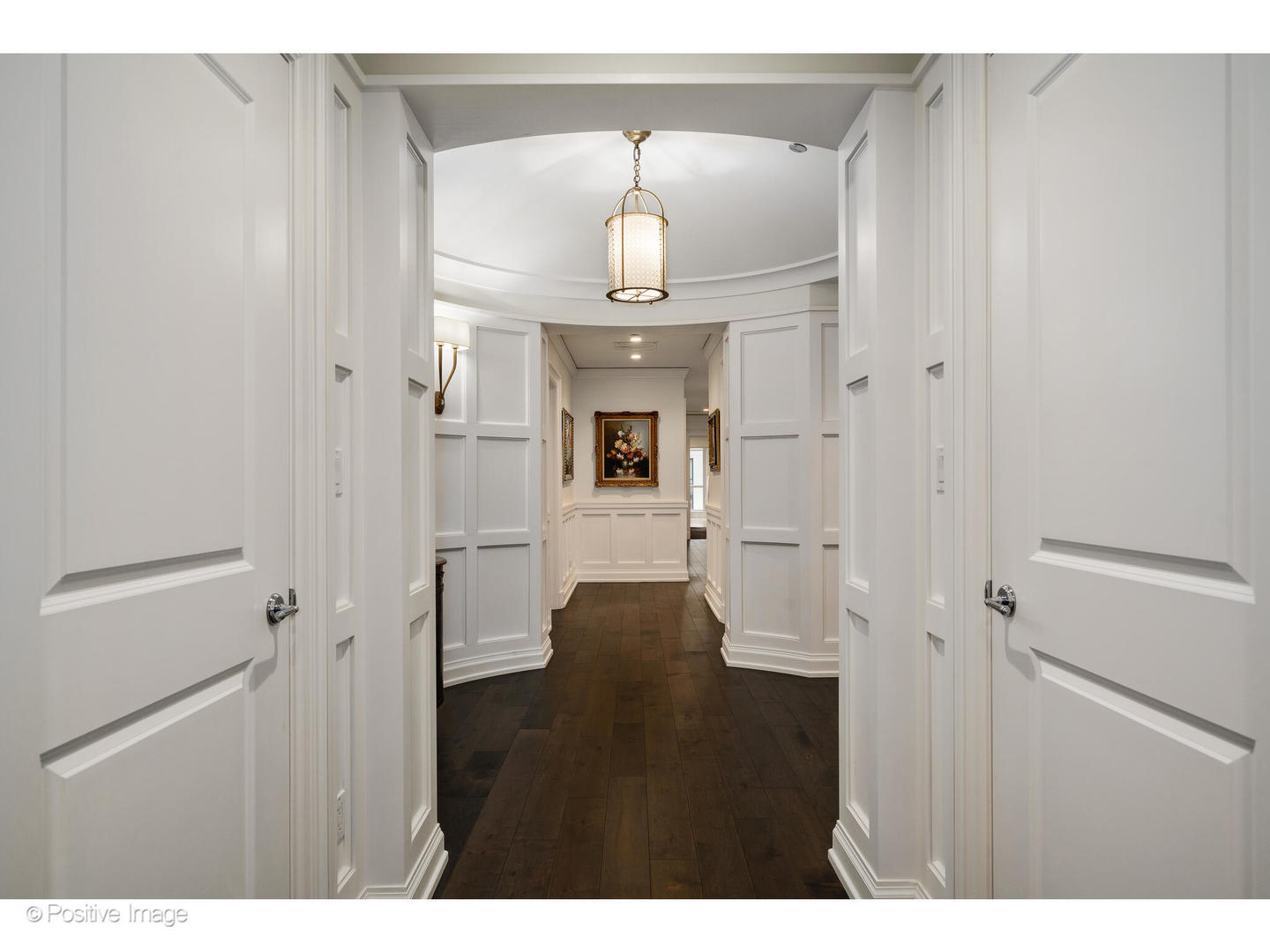 11 East Walton Street, Unit 3201 Chicago, IL 60611 - Photo 3 of 42 a view of a hallway with wooden floor and staircase