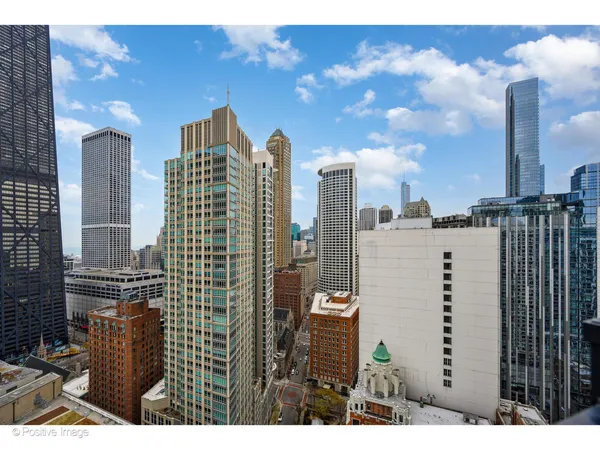 a view of city with tall buildings