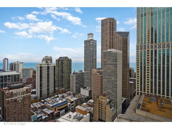 a view of city with tall buildings