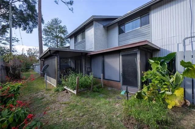 a house with trees in front of it
