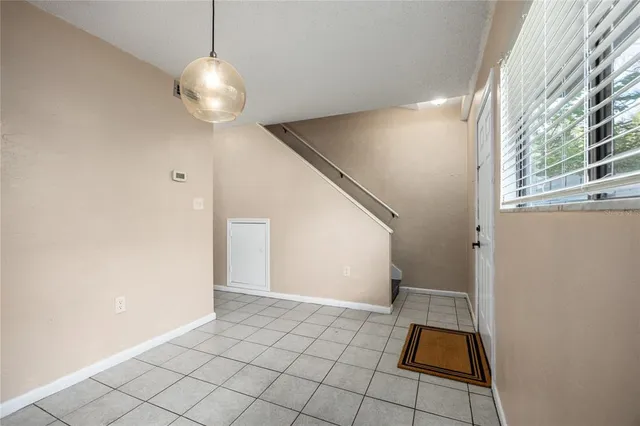 a view of an empty room and window