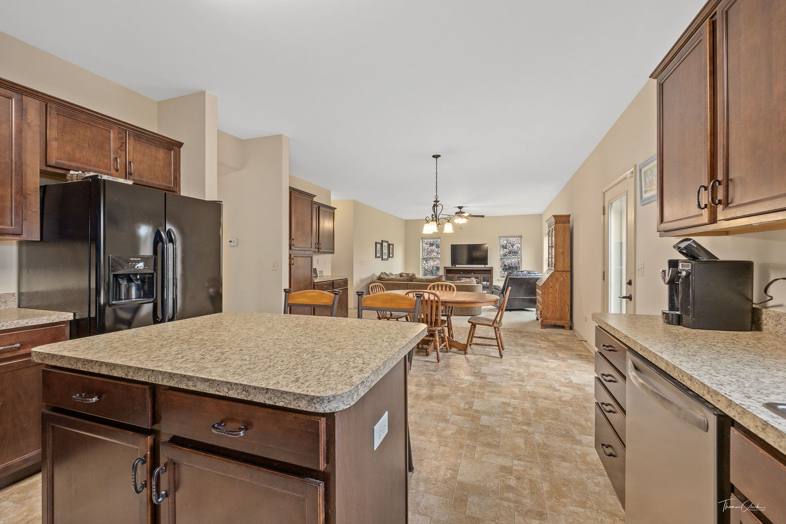 8022 West Offner Road Peotone, IL 60468 - Photo 19 of 42 a kitchen with a stove a refrigerator and a fireplace