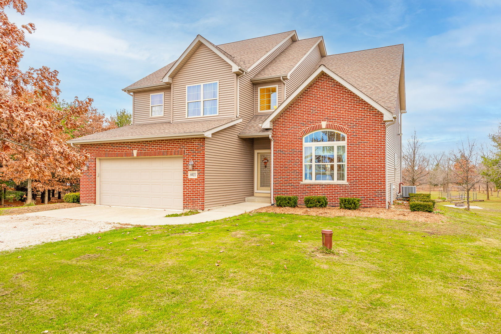 8022 West Offner Road Peotone, IL 60468 - Photo 2 of 42 a front view of a house with a yard
