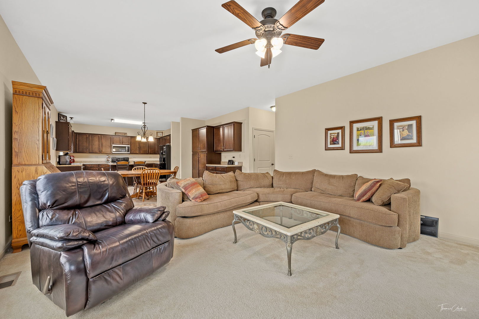 8022 West Offner Road Peotone, IL 60468 - Photo 23 of 42 a living room with furniture and a view of kitchen