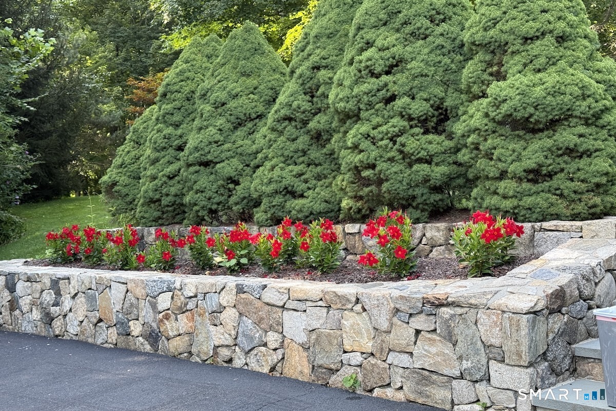 3 Hawthorne Hill Road Newtown, CT 06470 - Photo 37 of 40 Custom Stonework Along Driveway and Front Walkway with Summer Plantings