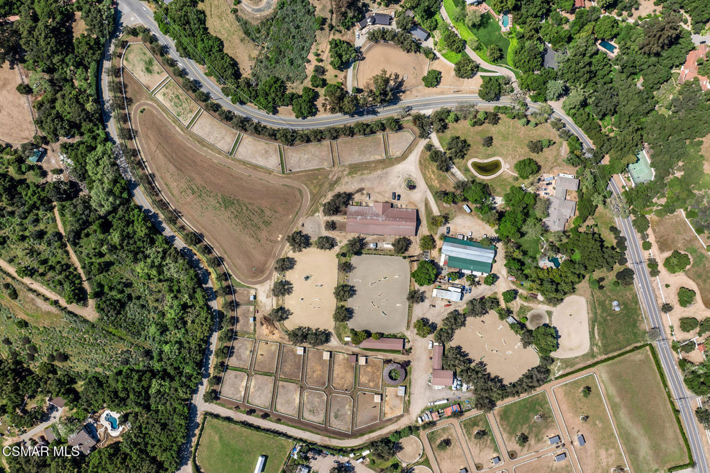 1812 West Potrero Road Thousand Oaks, CA 91361 - Photo 12 of 35 an aerial view of a house with a yard and large trees