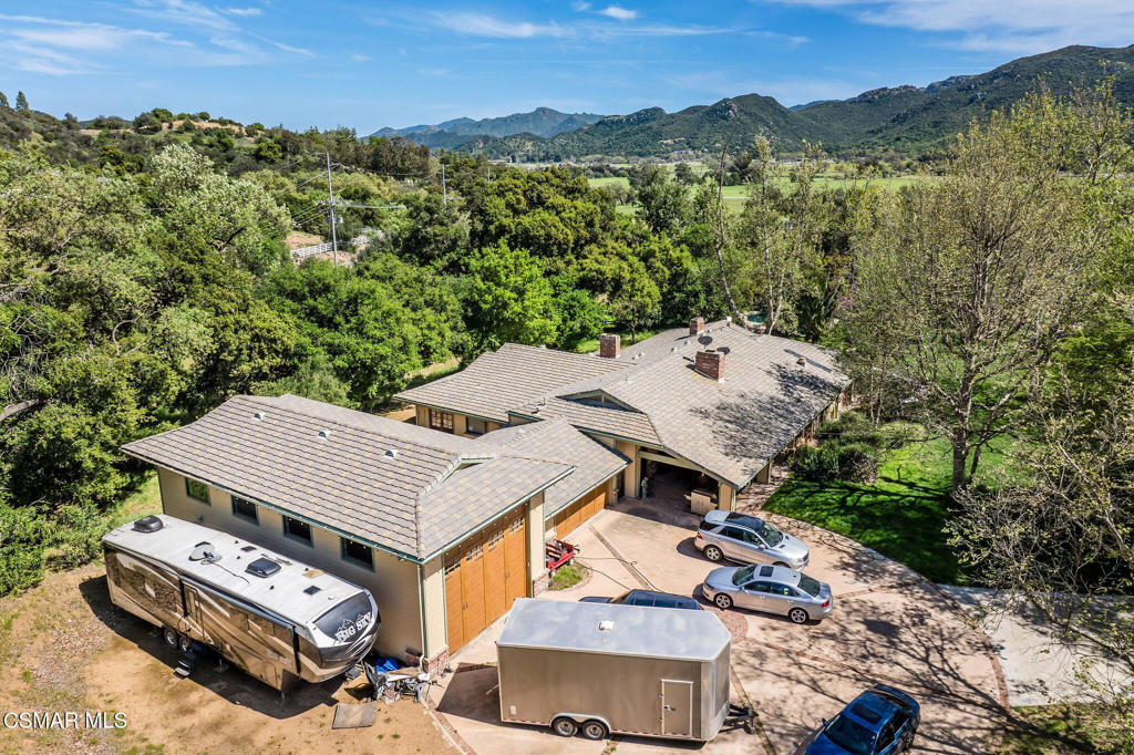 1812 West Potrero Road Thousand Oaks, CA 91361 - Photo 7 of 35 an aerial view of a house with a mountain