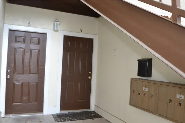 a view of a hallway with elevator