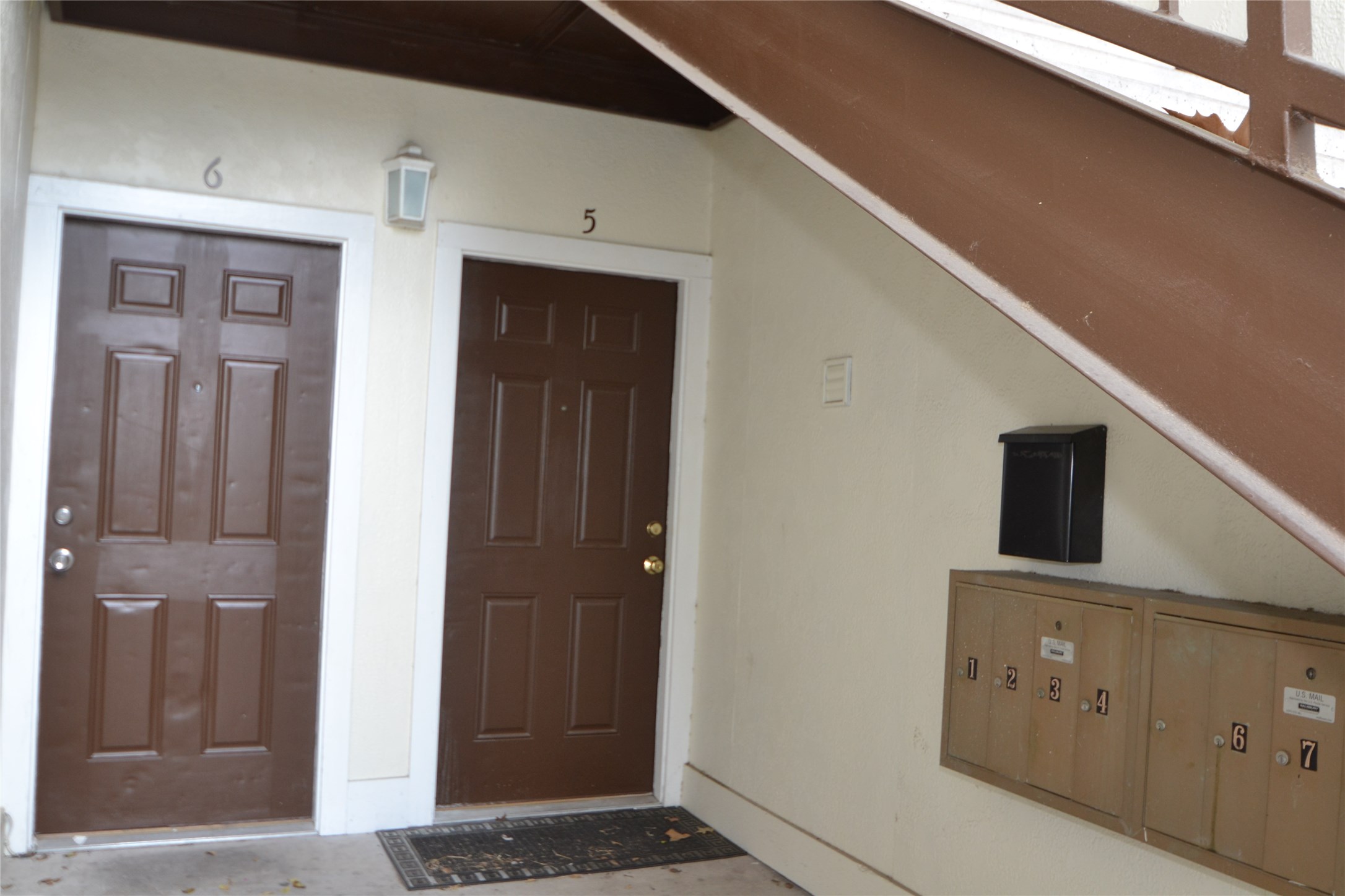 a view of a hallway with elevator